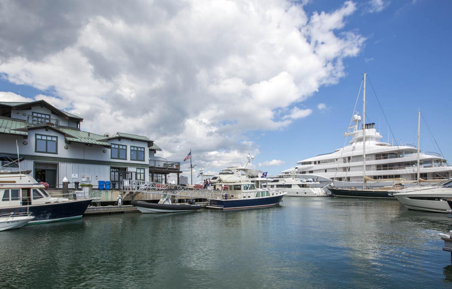 The marina on the water with a yacht